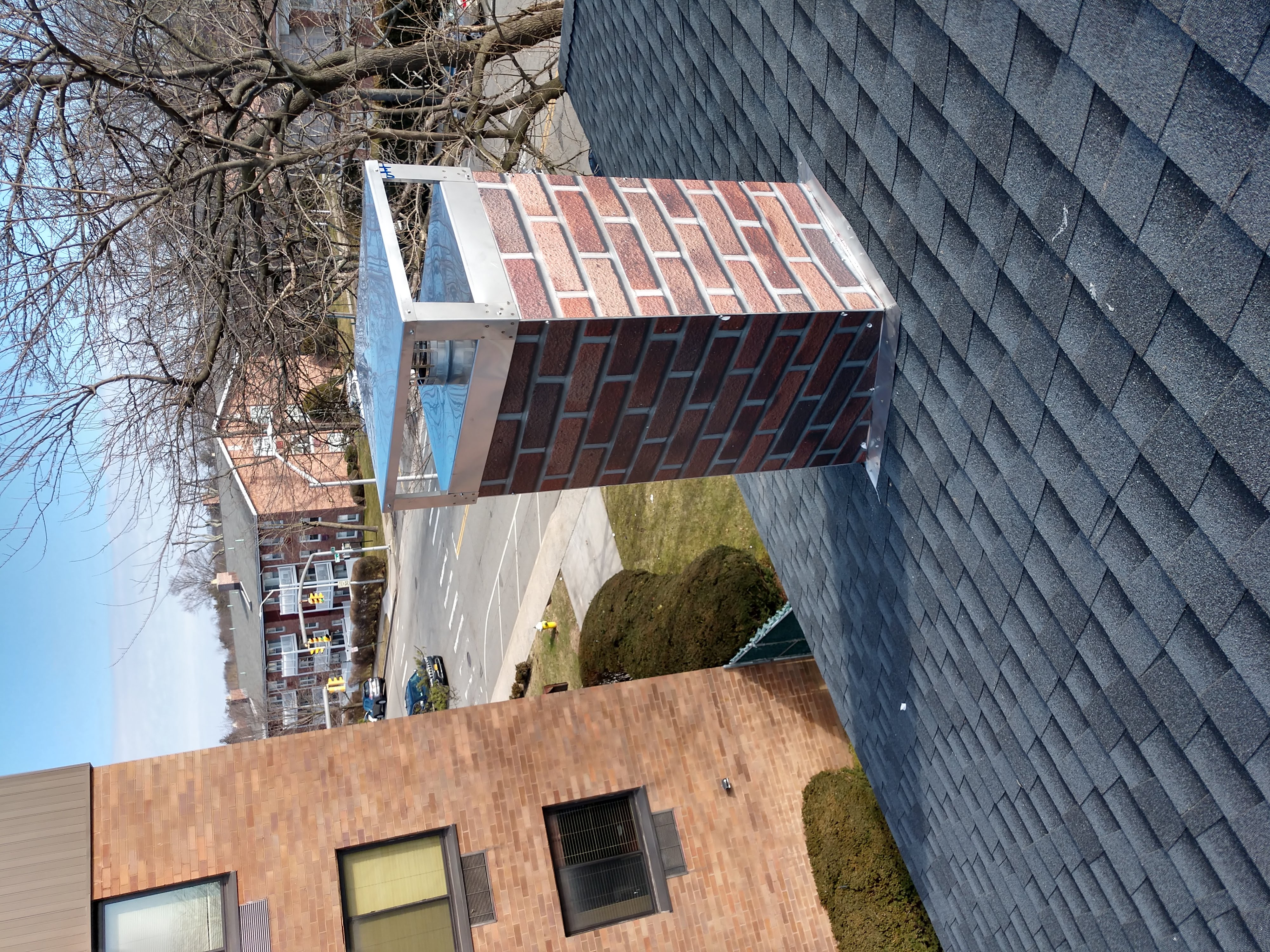 New elastomeric sealant applied to chimney crown in Massapequa Park, NY