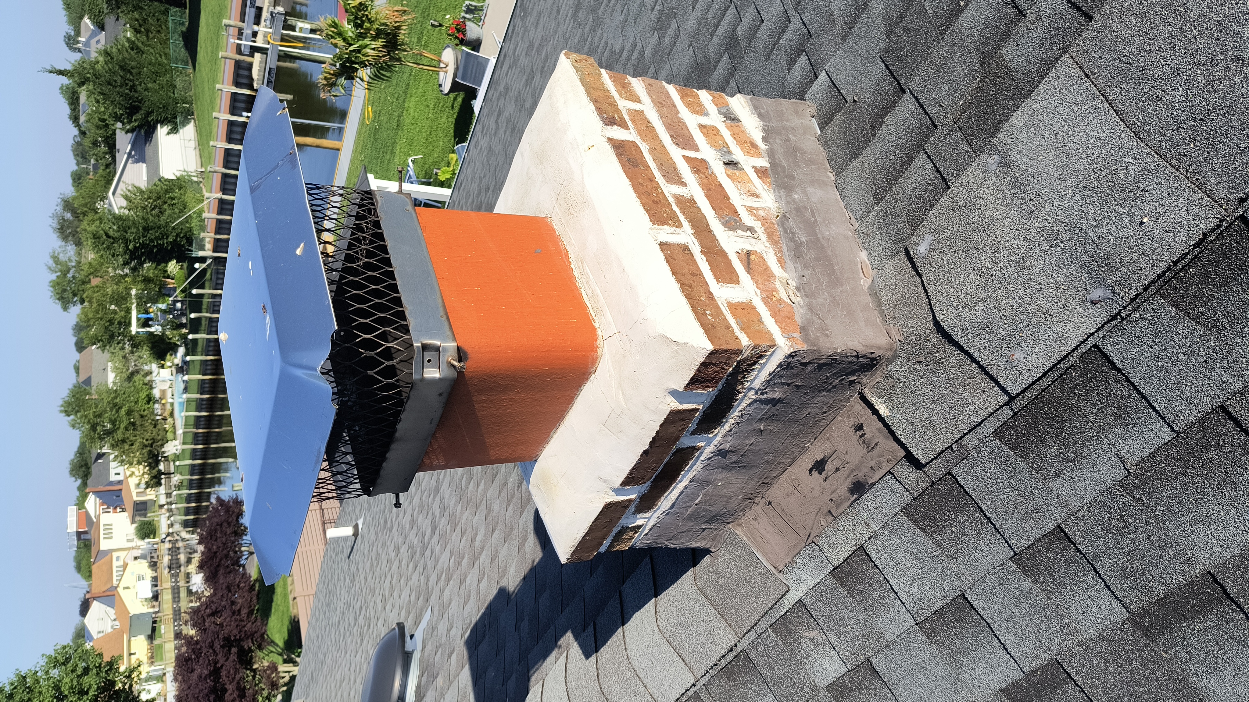 Full chimney masonry rebuild and restoration in Massapequa Park, NY