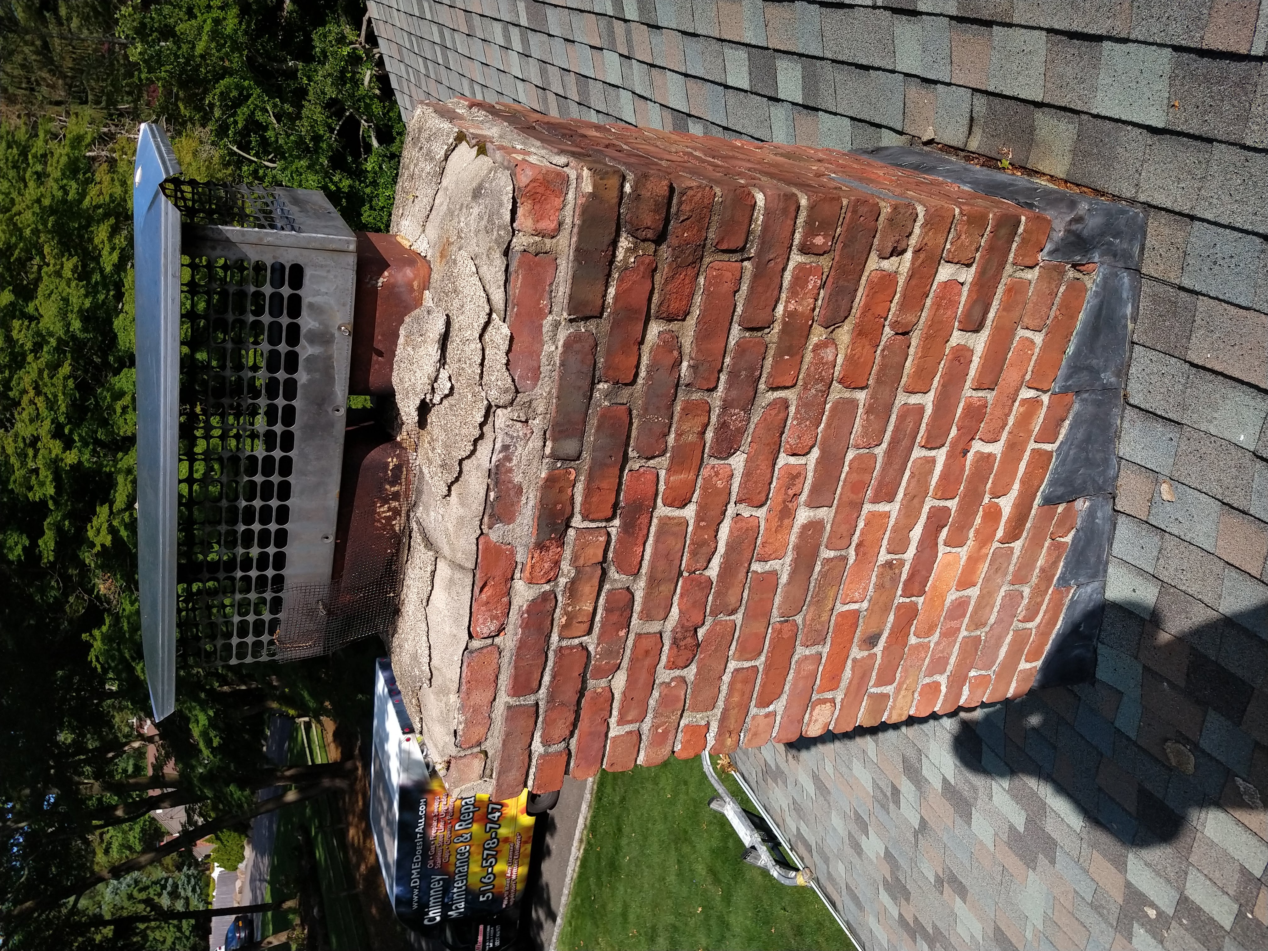 Cracked chimney crown professionally repaired in Massapequa Park, New York
